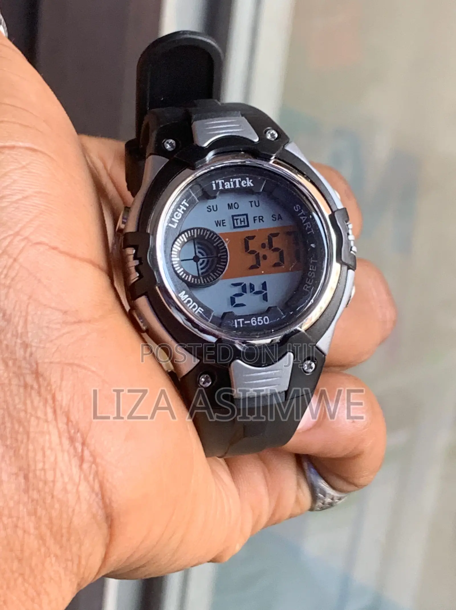 Kids Digital Sports Watch Featuring a Black and Silver Plastic Case