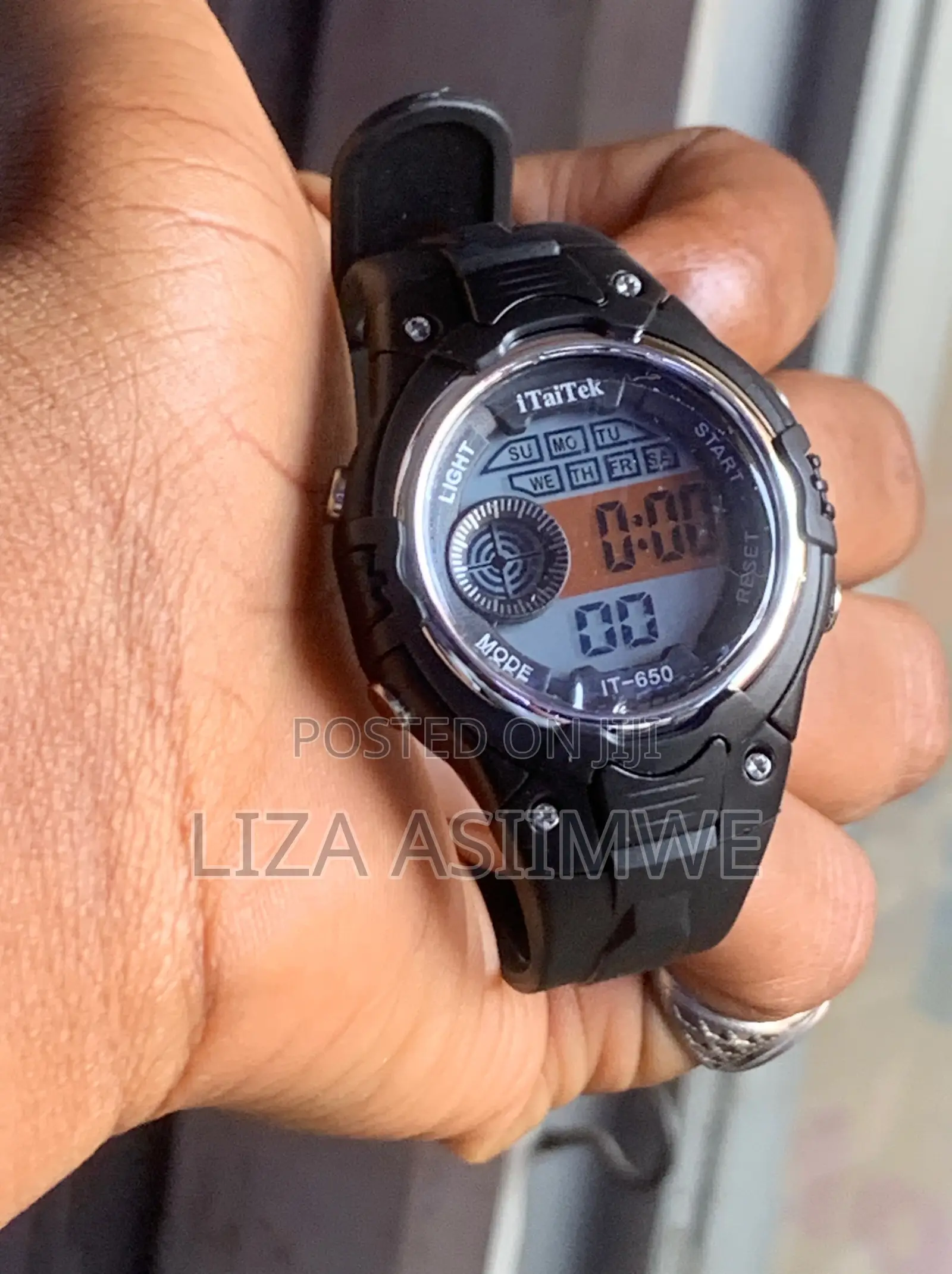 Children’s Digital Sports Watch With a Black Resin Case and Strap.