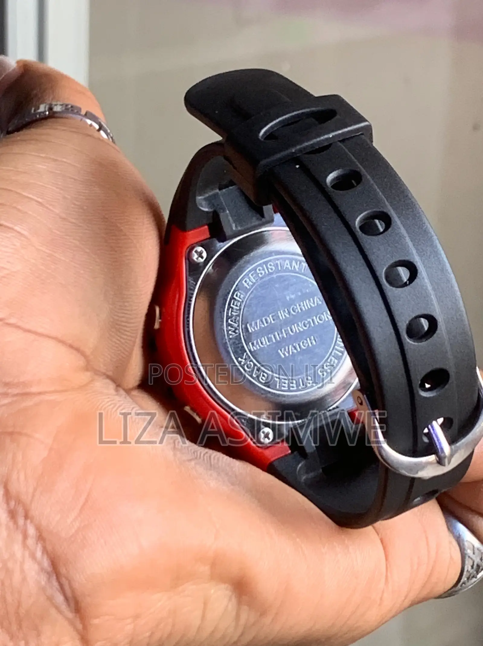 Children’s Digital Sports Watch With a Black and Red Resin Strap