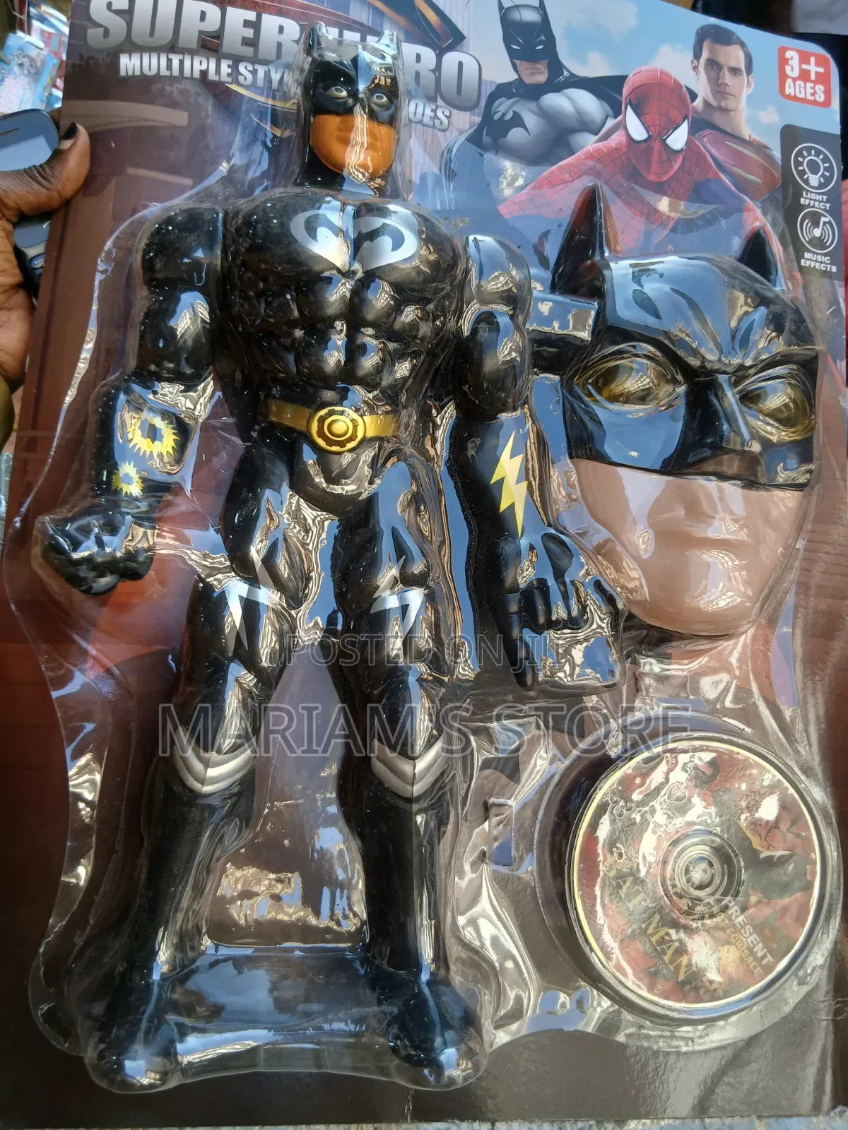 Black and Gold Batman Action Figure With Matching Mask.