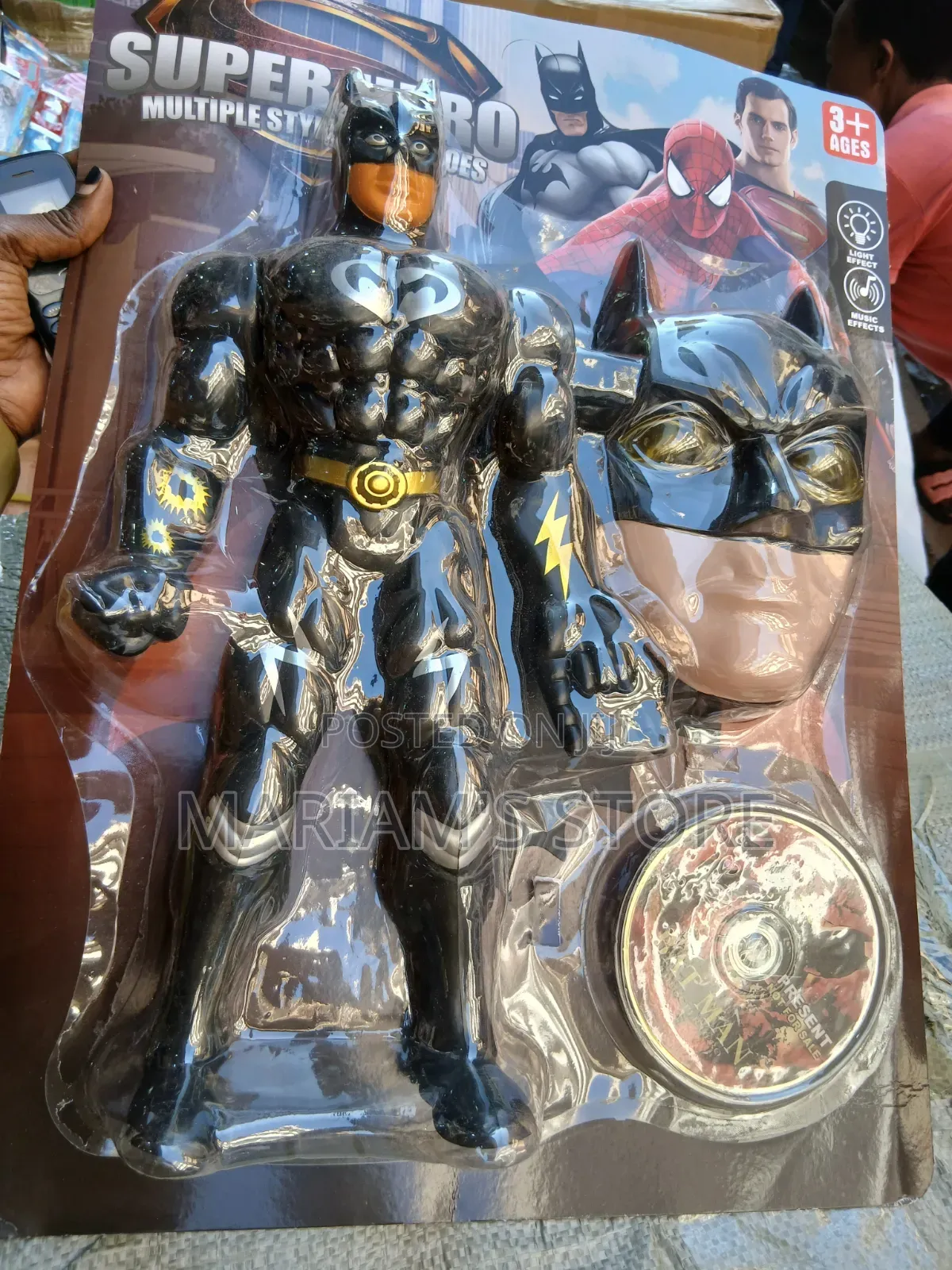Black and Gold Batman Action Figure With Matching Mask.
