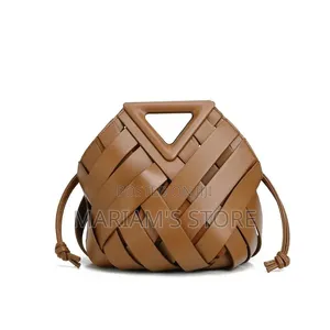 Woven Leather Bucket Handbags With a Distinct Triangular Top Handle