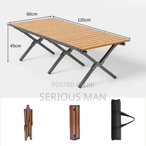 Folding Camping Table Featuring a Light Wooden Roll-Up Slat Top