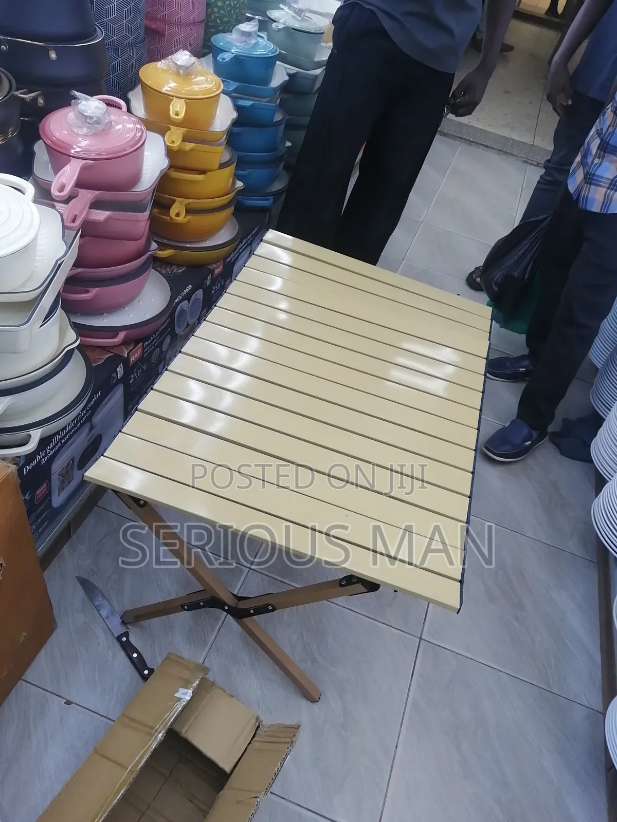 Folding Camping Table Featuring a Light Wooden Roll-Up Slat Top