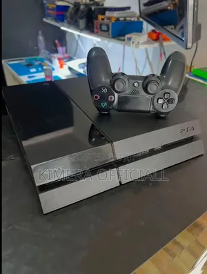 Sony PlayStation 4 Standard Fat Chipped Console 12 Games and 2 Pads