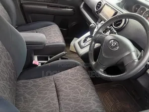 Toyota Corolla Rumion 2011 Maroon