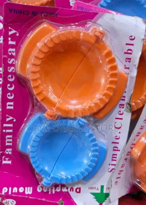 Set of Plastic Dumpling and Empanada Press Moulds in Orange and Blue.