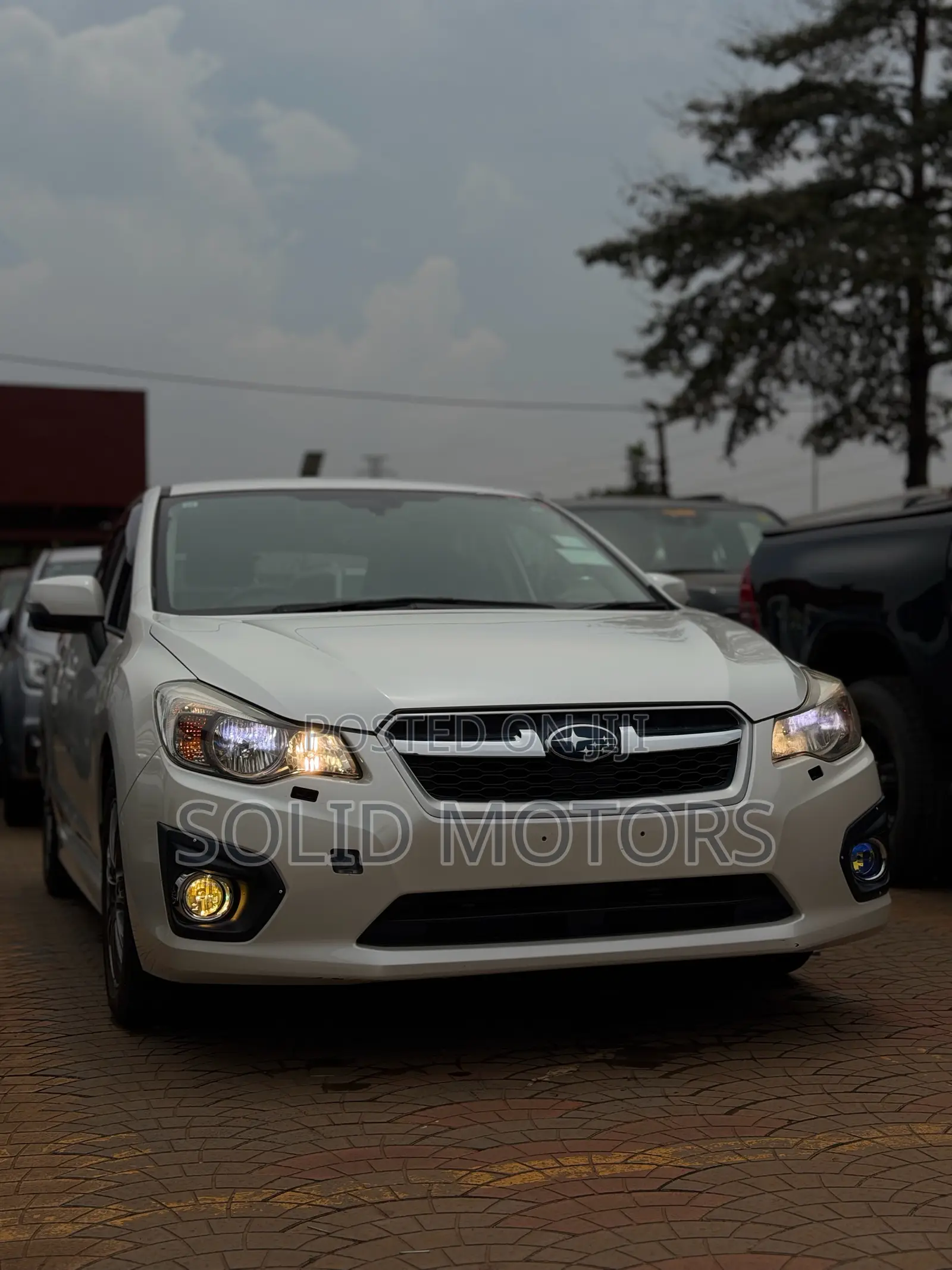 Subaru Impreza 2.0i Limited PZEV 4dr Hatchback AWD (2.0L 4cyl CVT) 2014