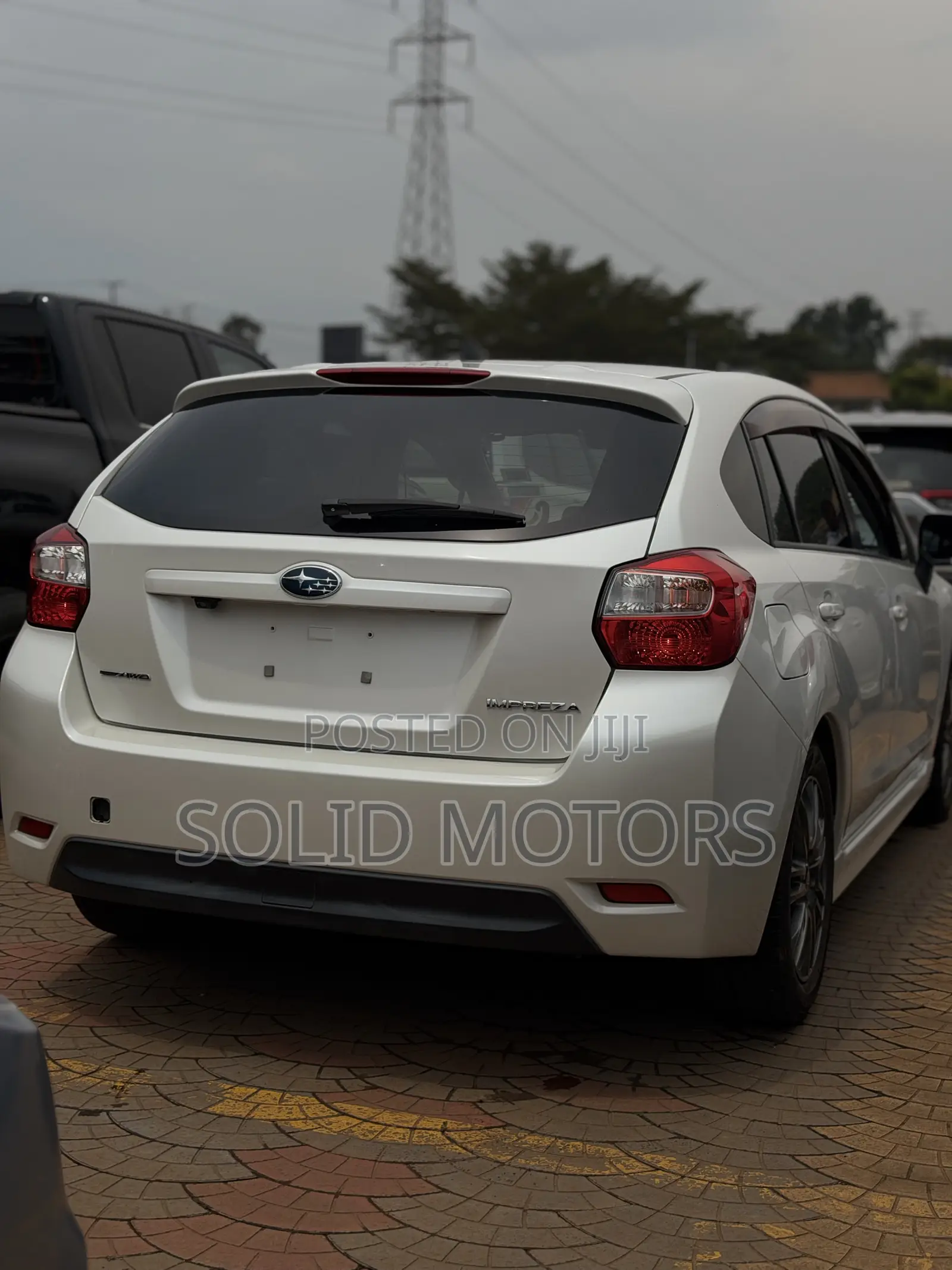 Subaru Impreza 2.0i Limited PZEV 4dr Hatchback AWD (2.0L 4cyl CVT) 2014