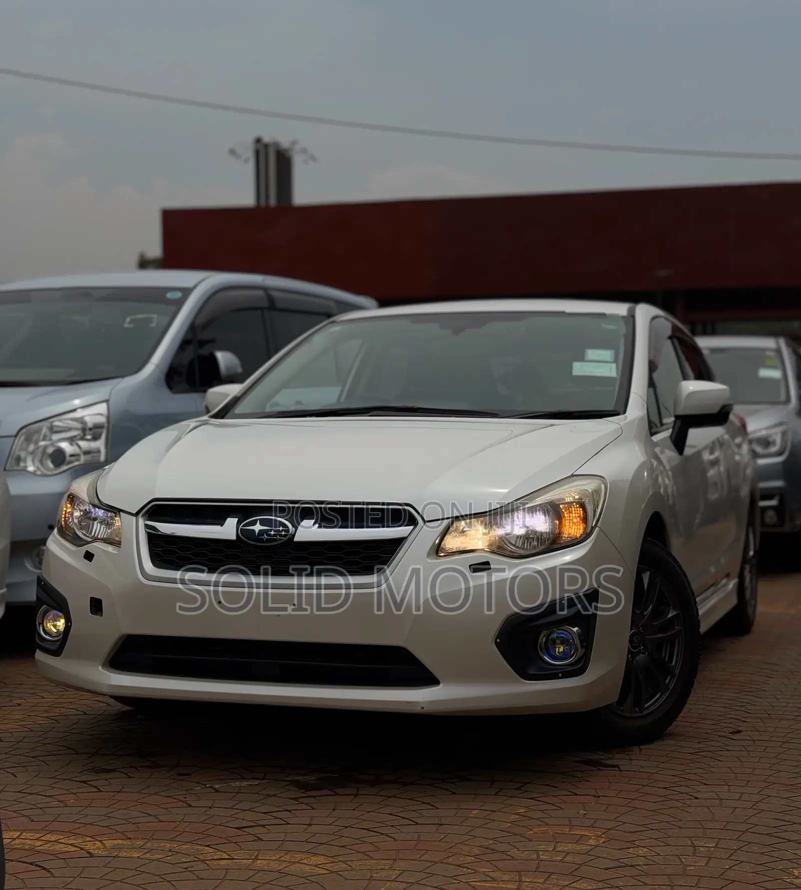 Subaru Impreza 2.0i Limited PZEV 4dr Hatchback AWD (2.0L 4cyl CVT) 2014