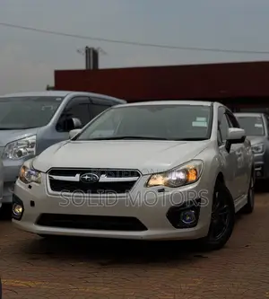 Subaru Impreza 2.0i Limited PZEV 4dr Hatchback AWD (2.0L 4cyl CVT) 2014