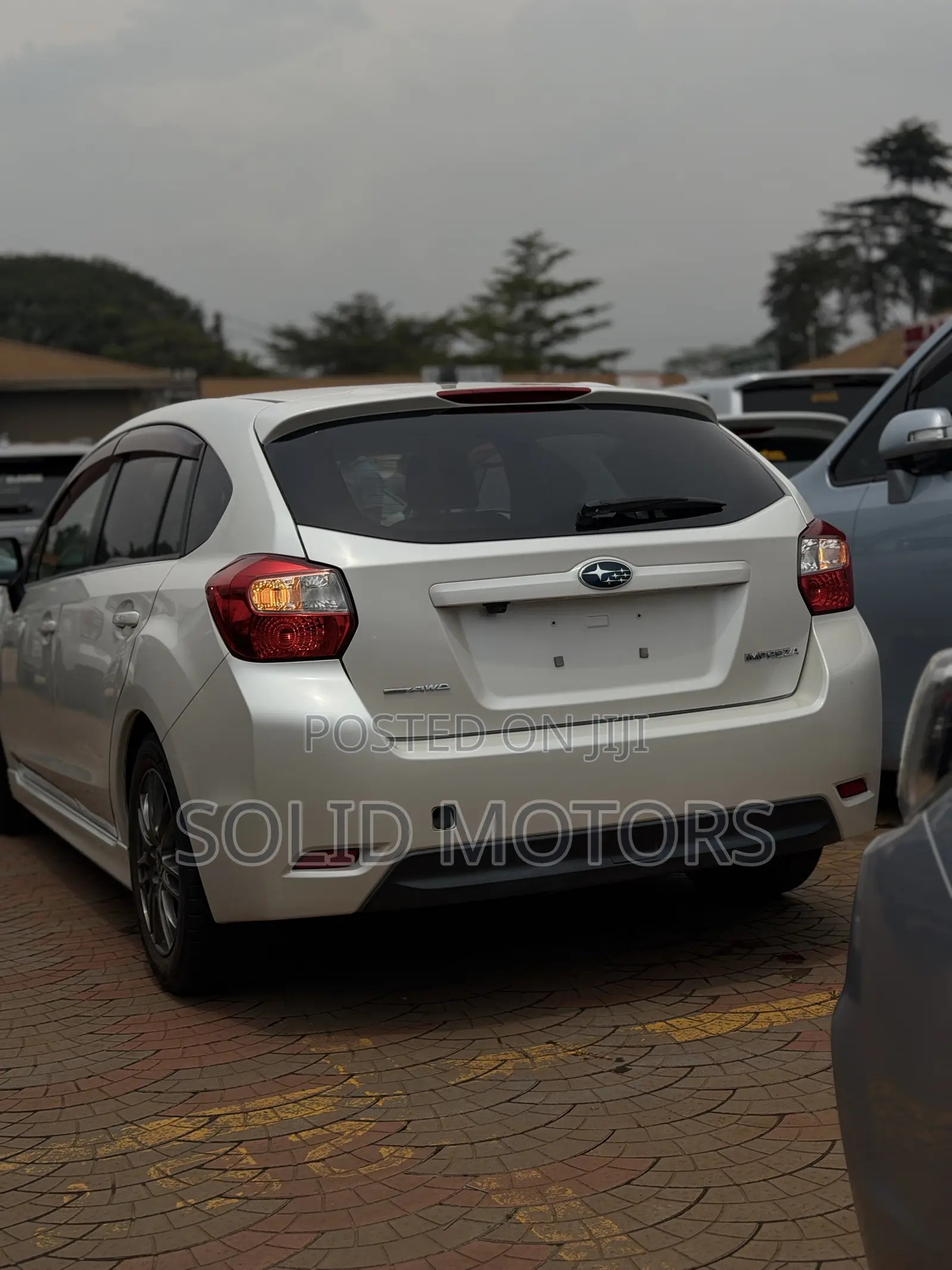 Subaru Impreza 2.0i Limited PZEV 4dr Hatchback AWD (2.0L 4cyl CVT) 2014