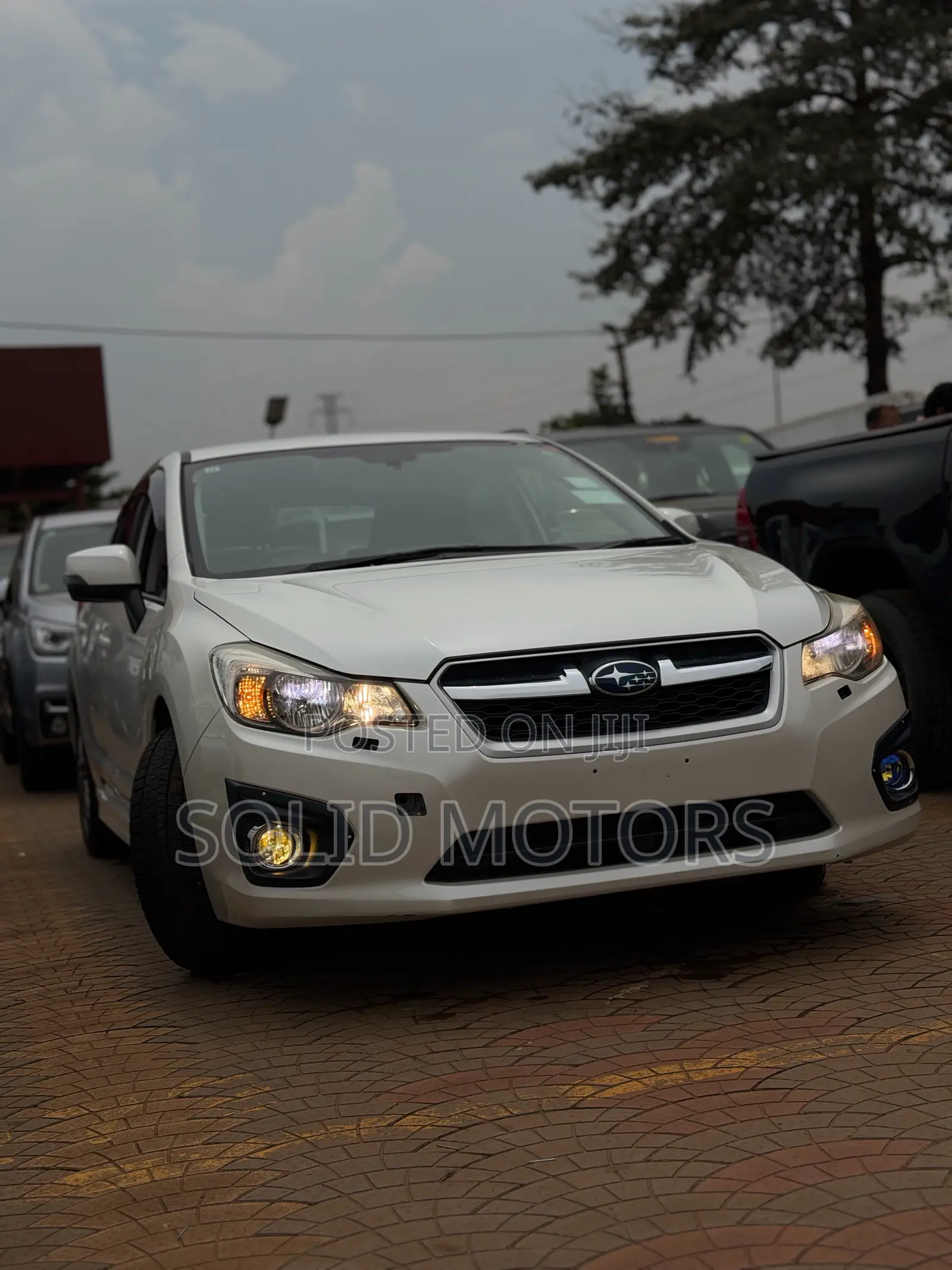Subaru Impreza 2.0i Limited PZEV 4dr Hatchback AWD (2.0L 4cyl CVT) 2014