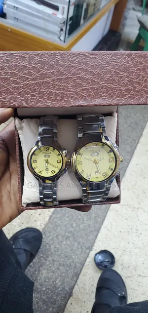 Police Analog Wristwatch Featuring a Bright Gold-Toned Dial