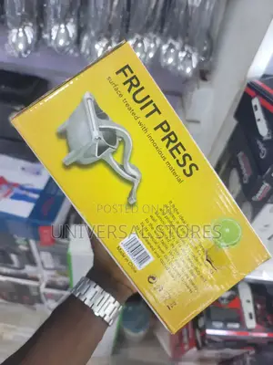 Manual Fruit Press. Silver