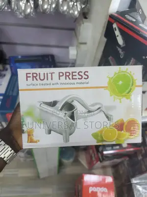 Manual Fruit Press. Silver