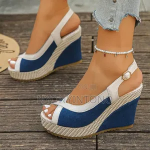 Toe-Cross Strap Wedge Shoe