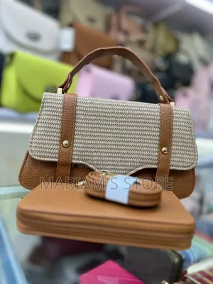 Textured Handbag Set Features a Woven Front Flap With Vertical Strap