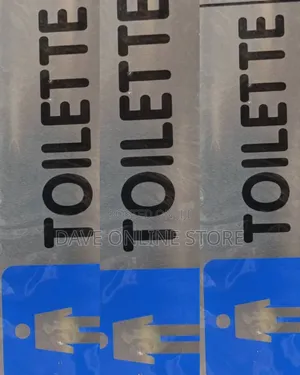 Men's Silver and Blue Aluminum Restroom Sign Labeled "TOILETTE".