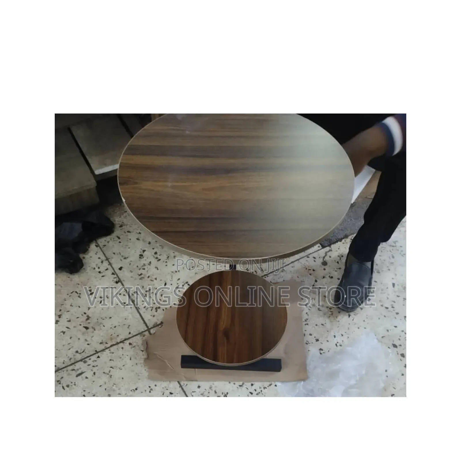 2-Piece Round Nesting Coffee Table Set With a Dark Walnut Wood Grain