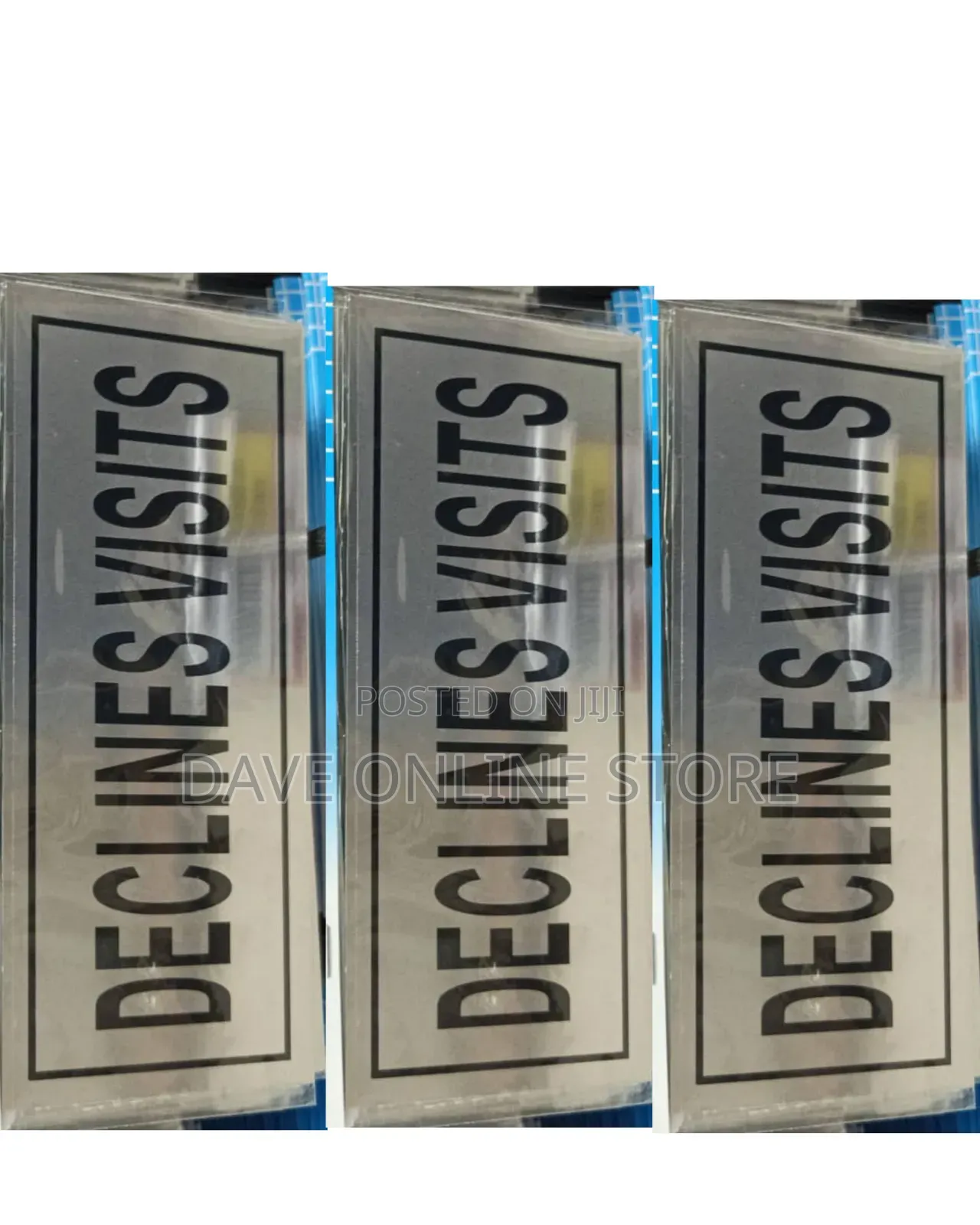 Silver Sign With a Black Border and the Words "DECLINES VISITS"