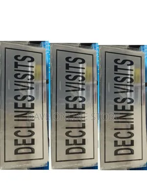 Silver Sign With a Black Border and the Words "DECLINES VISITS"