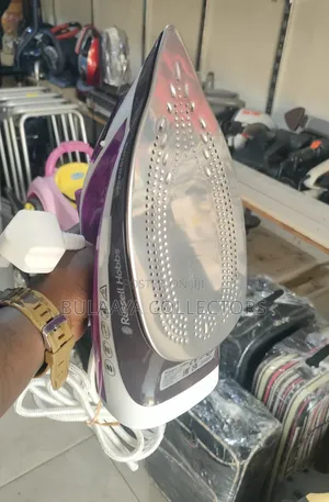 UK Used Russell Hobbs Speedglide Steam Iron in Purple and White, 2400w