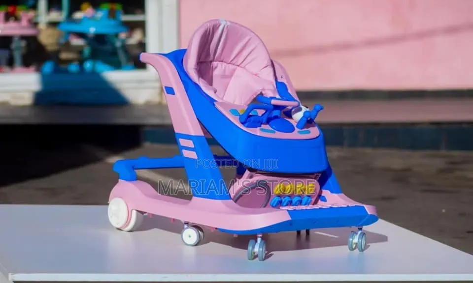 Multi-Functional Baby Walker With Mute Wheels and an Activity Tray. ]