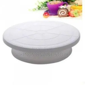 White Plastic Rotating Cake Decorating Turntable With a Circular
