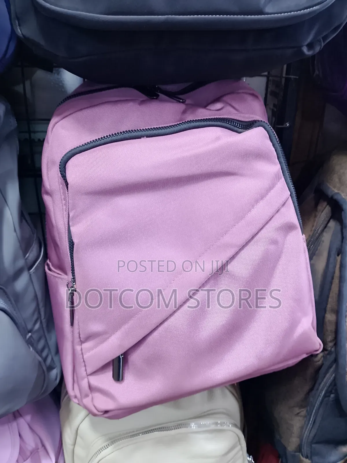 Casual Nylon Ladies Backpack With a Diagonal Front Zipper Pocket.