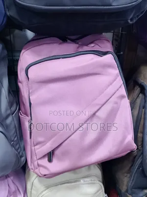 Casual Nylon Ladies Backpack With a Diagonal Front Zipper Pocket.