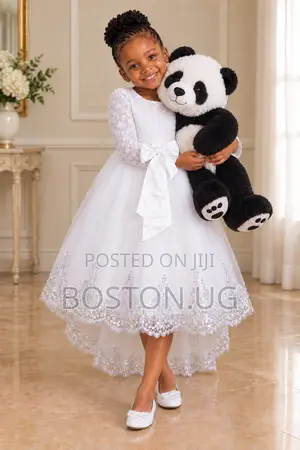 Girls White Dresses With a Short Train