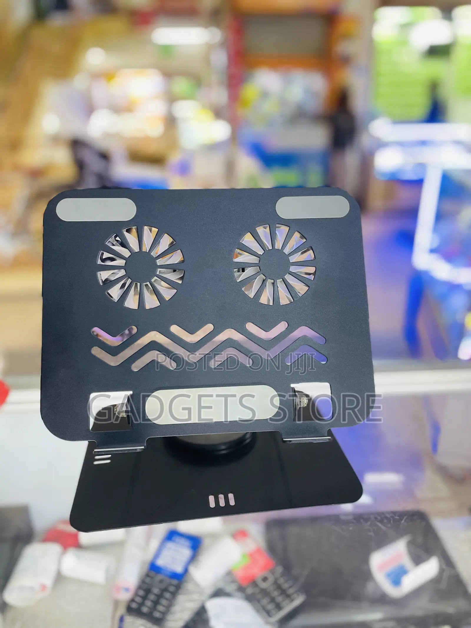 360° Rotating Carbon Steel Laptop and Tablet Stand Dual Cooling Fans.