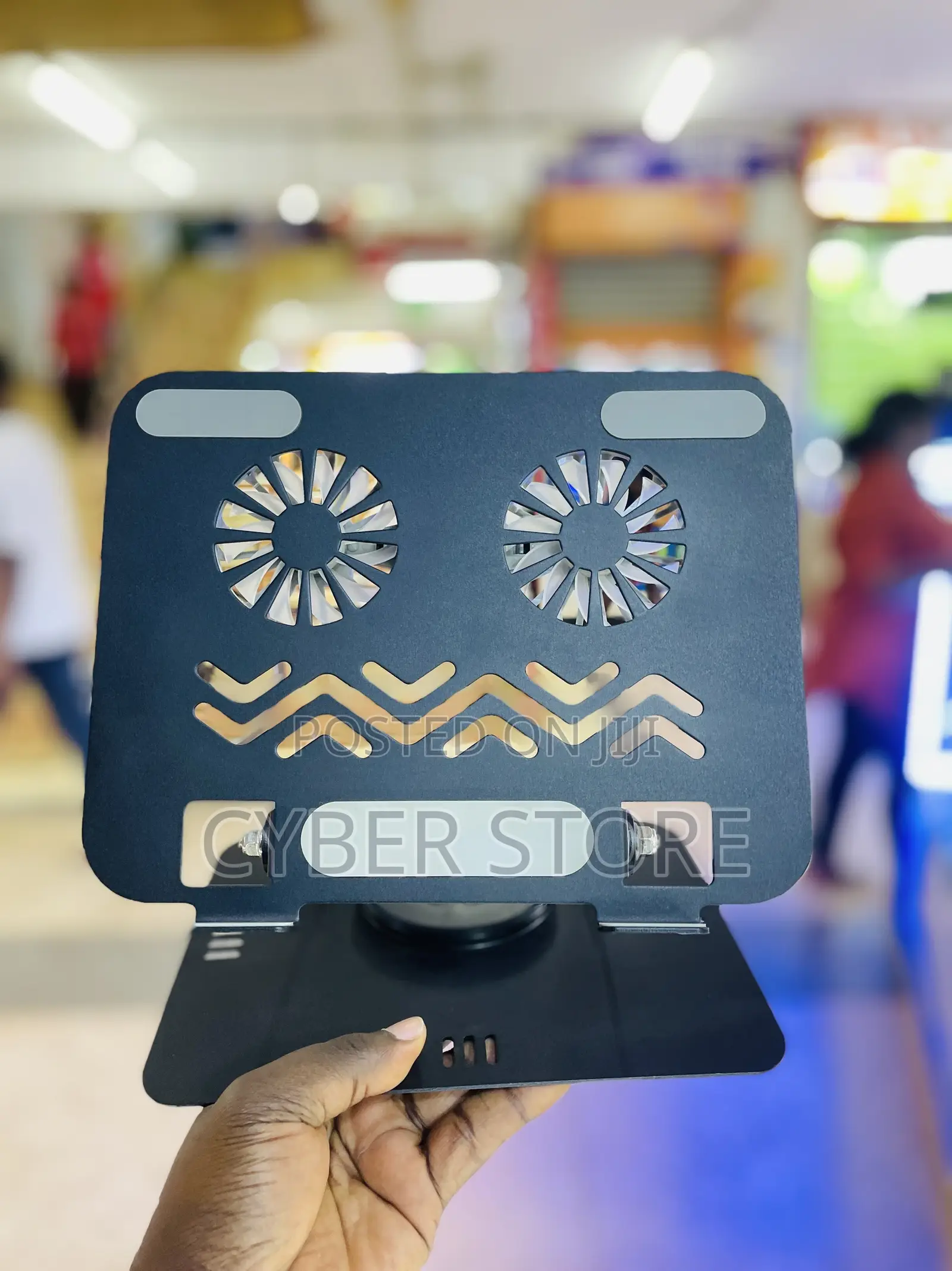 360° Rotating Carbon Steel Laptop and Tablet Stand Dual Cooling Fans.
