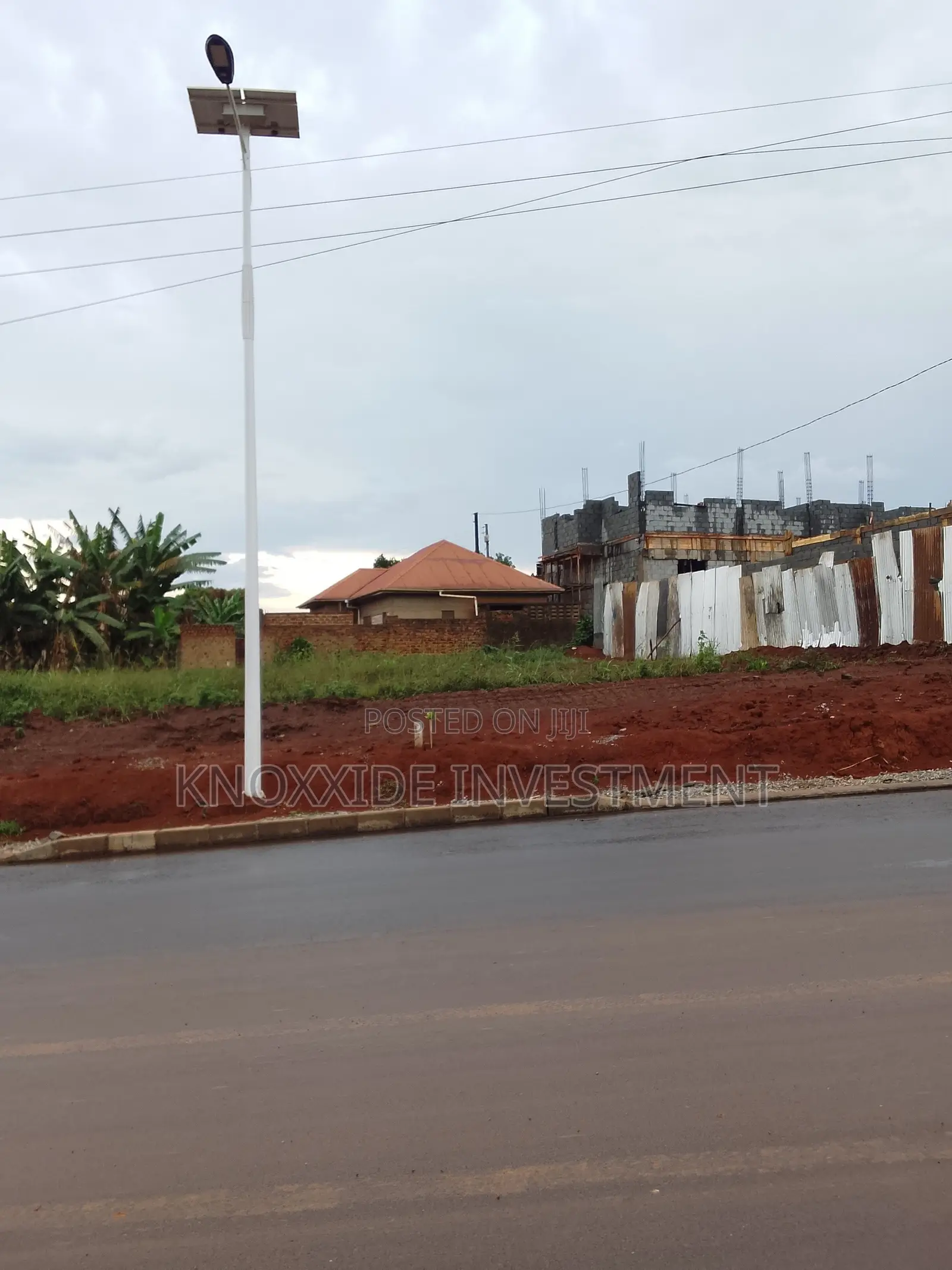 Land for Sale 100x100ft at 50m Ugx Ready Tittle Bukasa Sentema Road