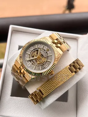 Golden Mechanical Men's Watch With a Bangle