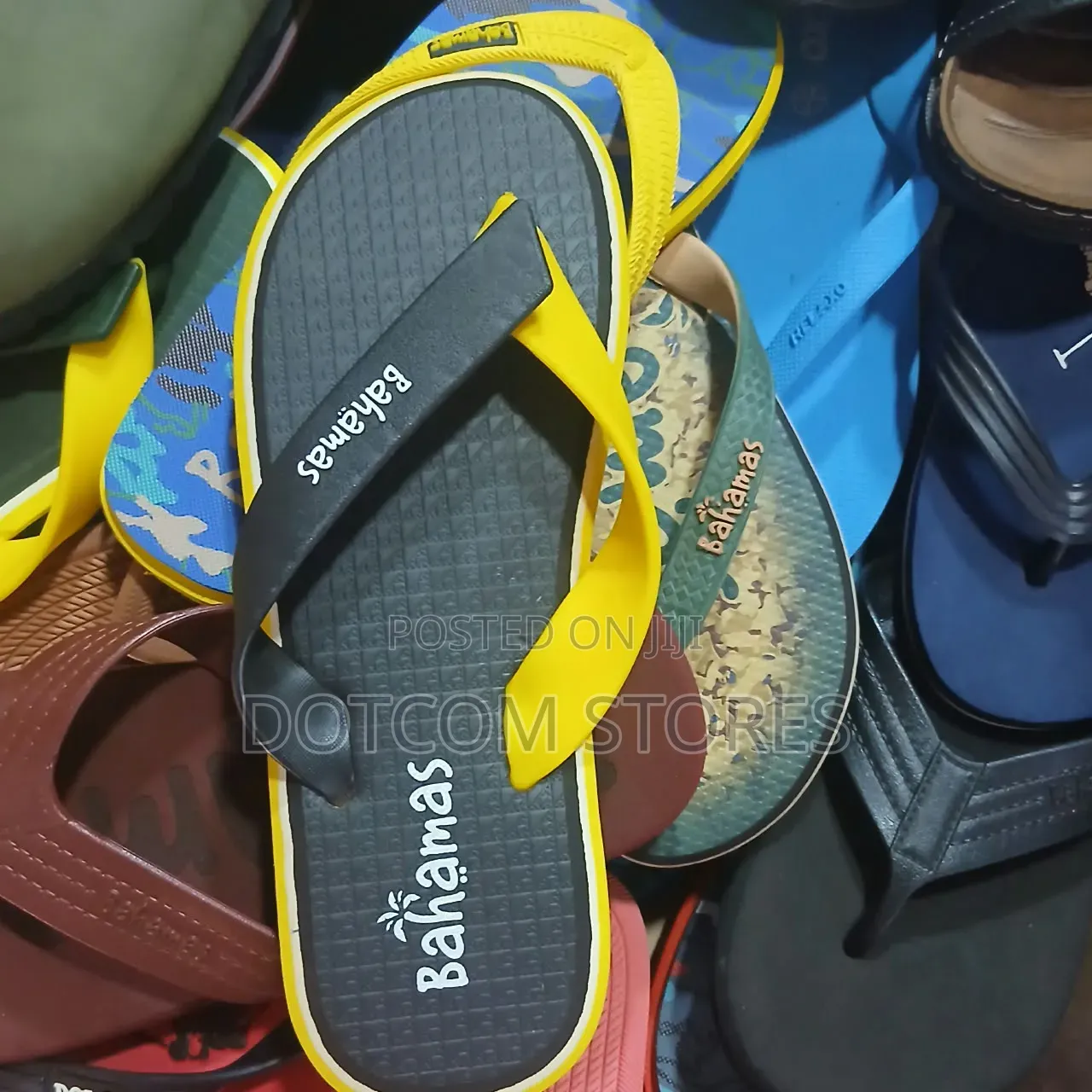 Pair of Black and Yellow Bahamas Flip-Flops.