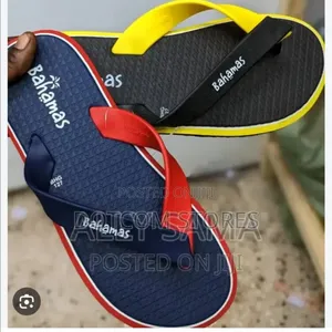 Pair of Black and Yellow Bahamas Flip-Flops.