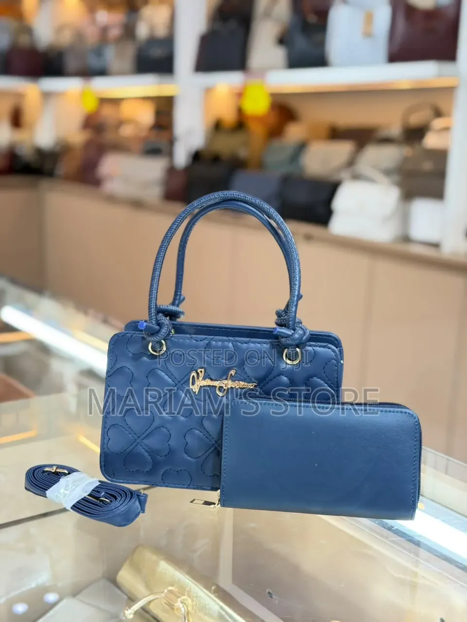Two-Piece Set a Quilted Handbag With a Clover Pattern