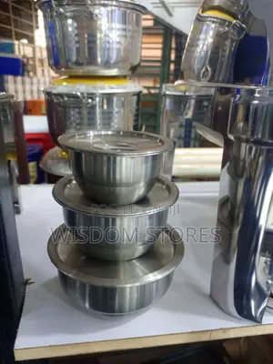 Small Stainless Steel Bowl With a Matching Lid.