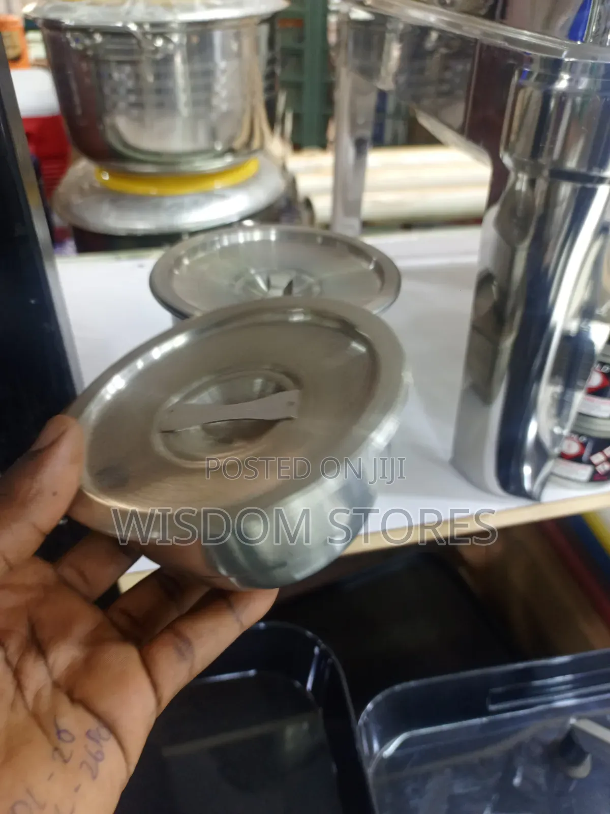 Small Stainless Steel Bowl With a Matching Lid.