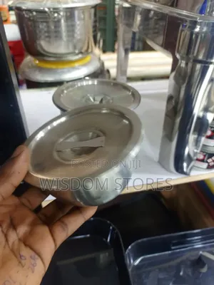 Small Stainless Steel Bowl With a Matching Lid.