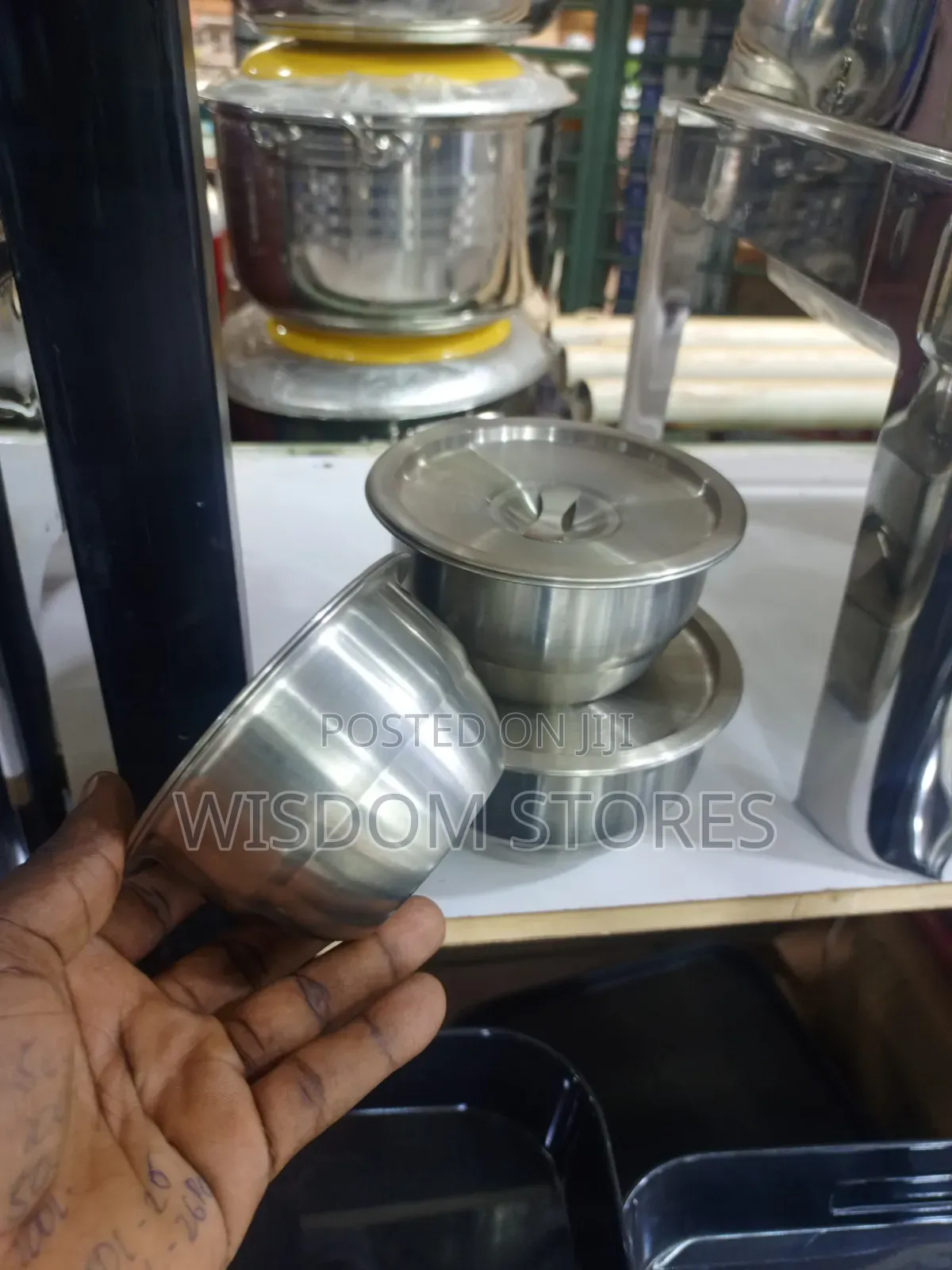 Small Stainless Steel Bowl With a Matching Lid.