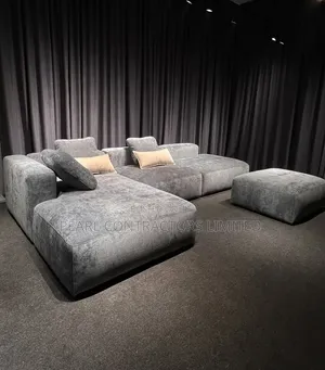 Sofas/Fancy Lsofa With an Extension Pouf.