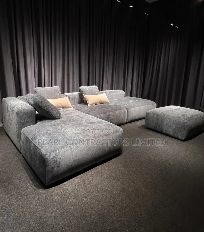Sofas/Fancy Lsofa With an Extension Pouf.
