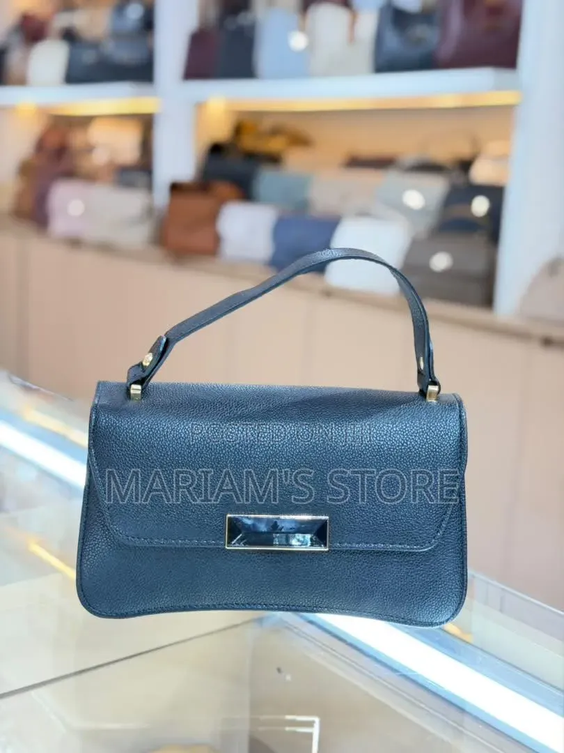 Handbag With a Textured Faux-Leather Finish With Front Flap