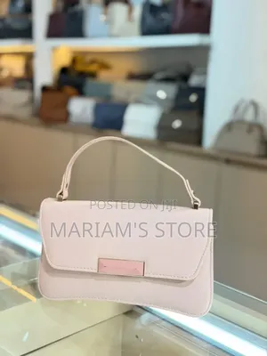 Handbag With a Textured Faux-Leather Finish With Front Flap