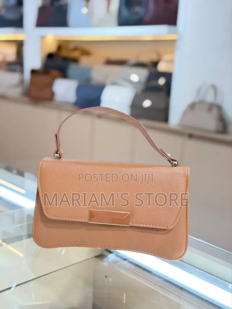 Handbag With a Textured Faux-Leather Finish With Front Flap