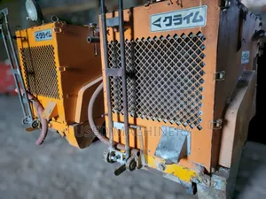 An Industrial Asphalt Joint Sealer / Crack Melter-Applicator