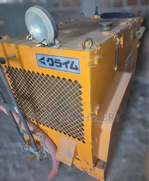 An Industrial Asphalt Joint Sealer / Crack Melter-Applicator